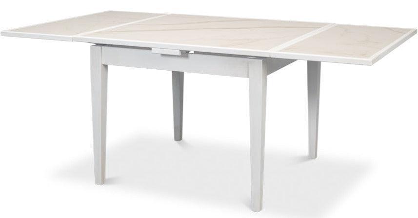 Tavolo da pranzo allungabile con piano in porcellana bianca