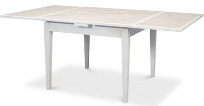 Tavolo da pranzo allungabile con piano in porcellana bianca