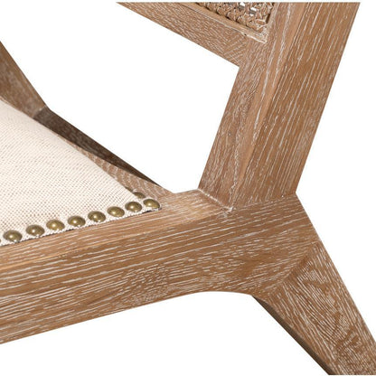 Poltrona con schienale in canna spazzato dal vento